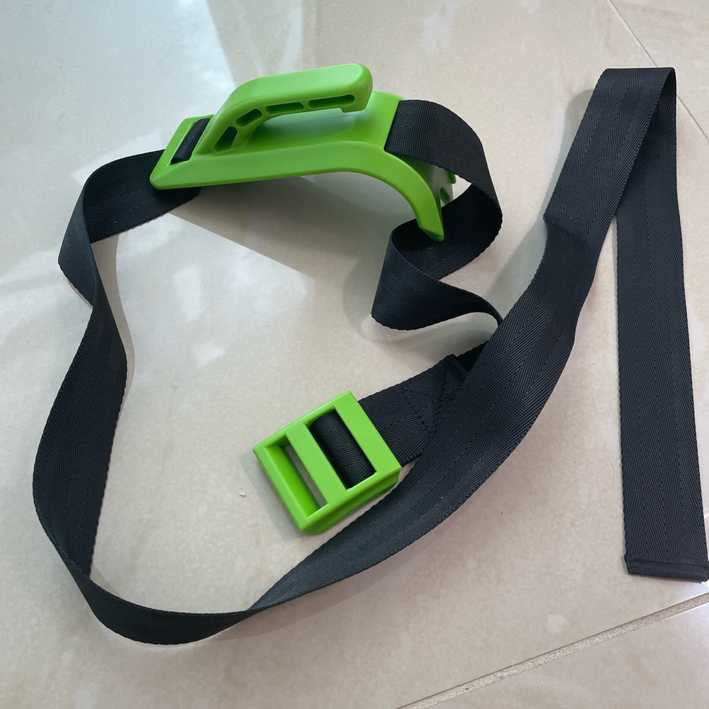 Pregnancy comfort seatbelt adjuster in green